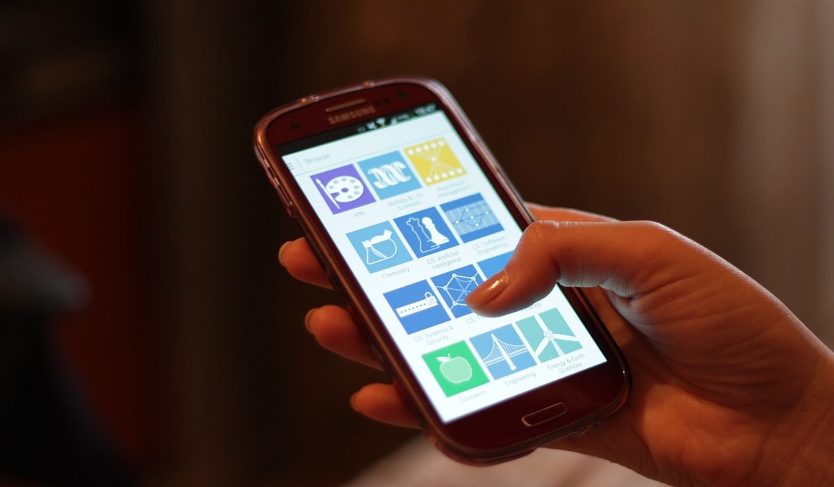 Smartphone screen in a hand